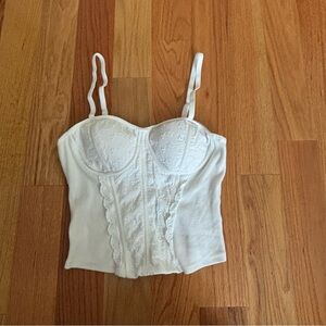 Cute white Corset top with lace detailing and adjustable straps